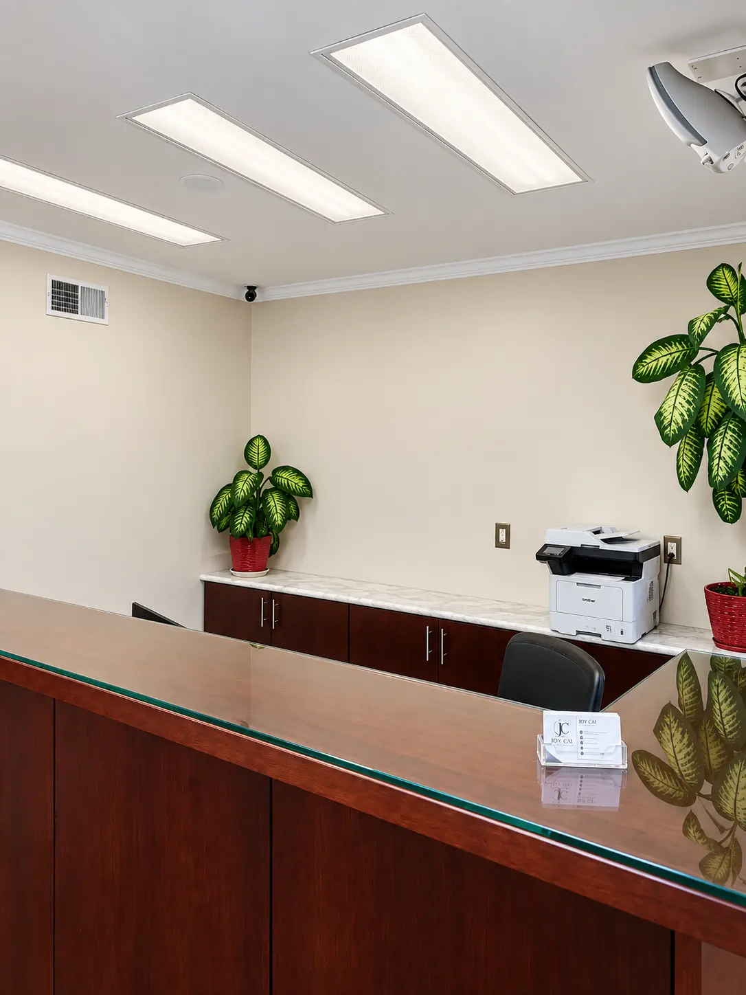 The Joy Cai Insurance Agency reception desk in Daly City, California